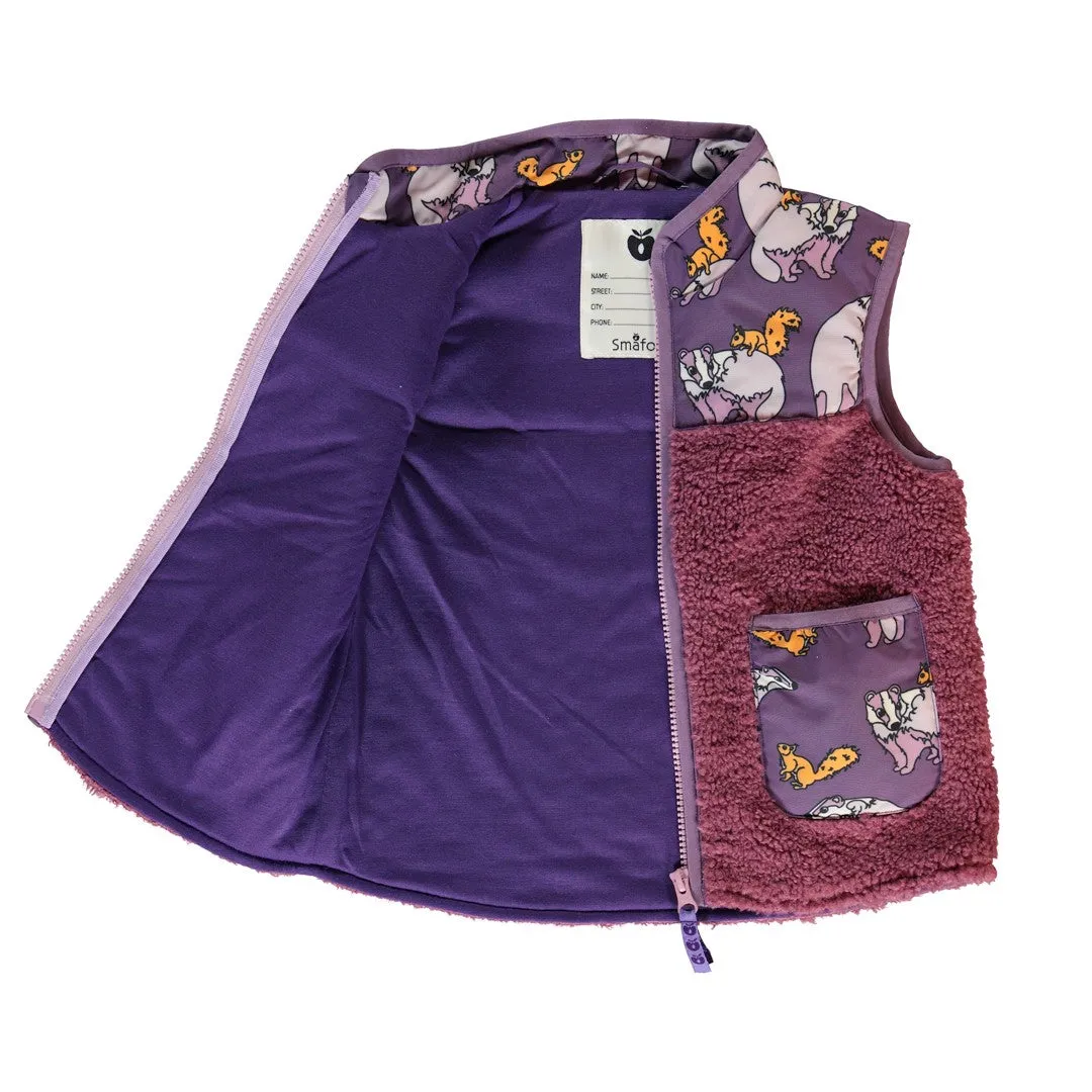 Fleece vest with badger and squirrel